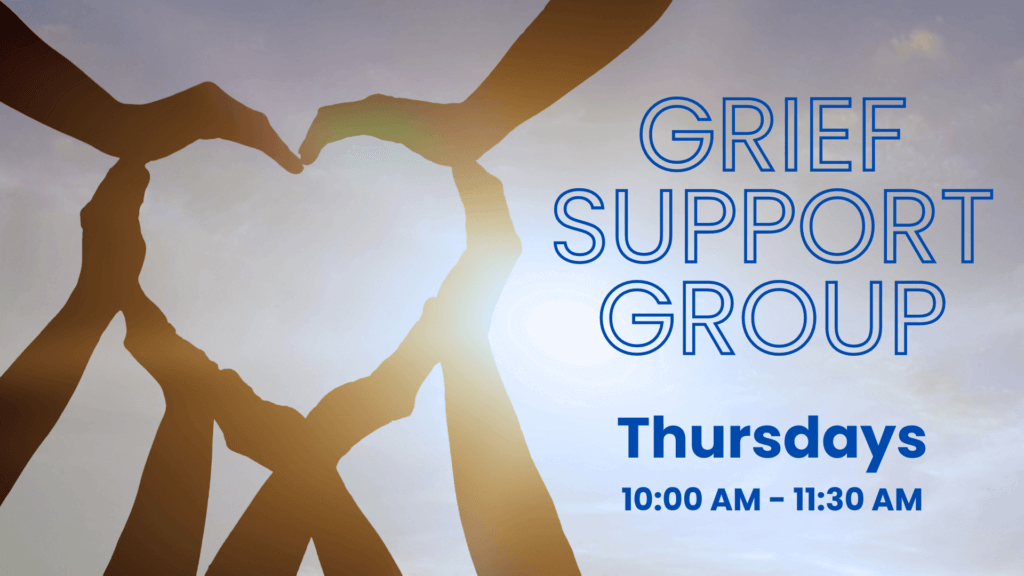 Advertisement for a Grief Support Group starting in September. 'Grief Support Group' is written in large blue letters, with 'Thursdays 10:00 AM – 11:30 AM' below it. The background features a silhouette of hands forming the shape of a heart against a sky with the sun shining through, creating a serene and supportive atmosphere.