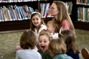 A photo of a group of children listening to storytime