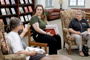 A photo of Sean leading her book club